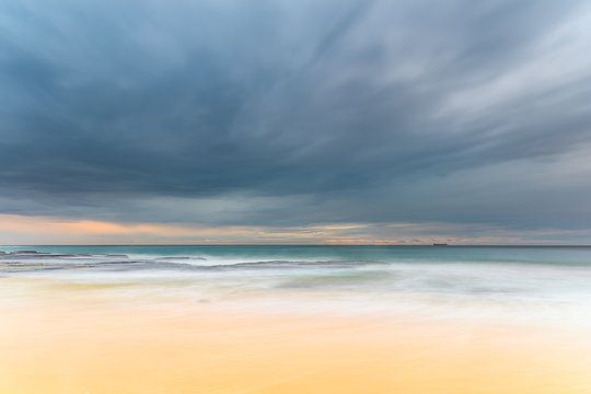 Early morning seascape with heavy clouds