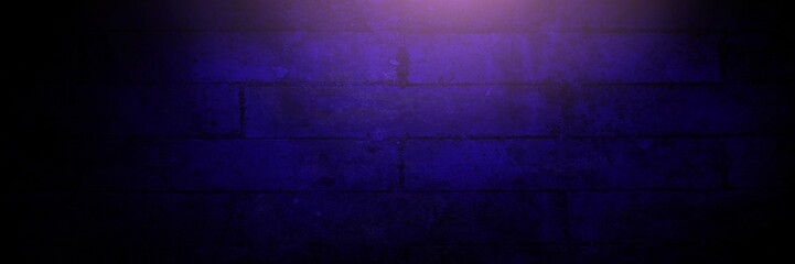 Vignette and light on purple brick wall background