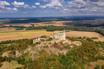 Aerial photo of beautiful medieval castle Kunětická hora near city of Pardubice in the heart of Czech Republic on the top of the hill in surrouding lowlands and villages nearby from ultralight plane