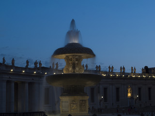 Cathedral of St Peters in the evening . fountain in the Plaza of St.Peter's, Vaticano, Italy, Rome 