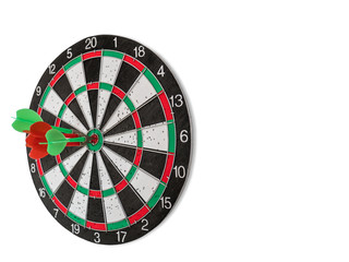 Isolated Dart Board with Holes on Dart Board Due to Throwing Darts Multiple Times. Four Darts Hit the Red Bullseye