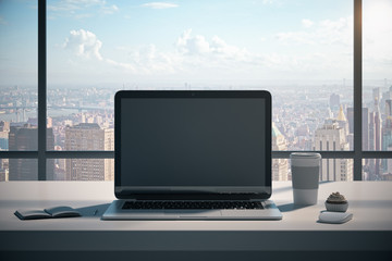 Fototapeta premium Contemporary desktop with empty laptop
