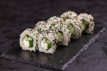 Sushi roll with cream cheese, sesame. Japanese food