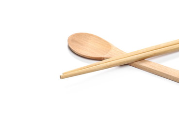 Asian wooden chopsticks and spoon isolated on white background