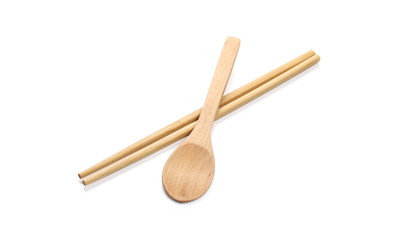 Asian wooden chopsticks and spoon isolated on white background