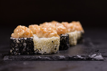 Sushi roll with cream cheese, sesame. Japanese food