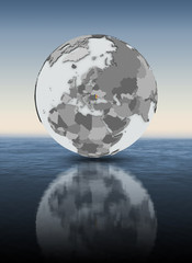 Moldova on globe above water