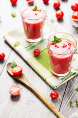 Tomato juice in glass mugs