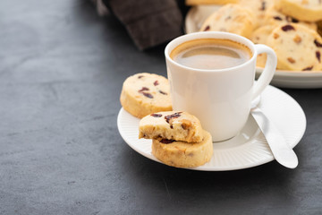 Closeup of cookies and a cup of coffee. Symbolic image. Concept for a tasty snack. Sweet dessert. Selective focus. Close up.