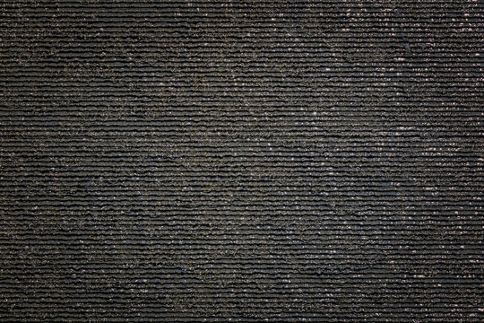 Beautiful wet black gray slate stone texture with water drops.