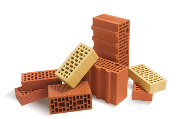 Obraz premium Composition of red and yellow bricks (ceramic blocks) on a white background.