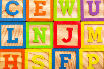 Fototapeta na wymiar Wooden alphabet blocks with letters