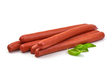 Hungarian smoked pork sausages with basil leaves, isolated on white background.