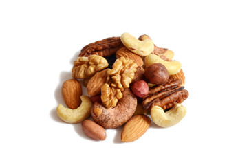 Several types of hazelnut cashew almonds on white background isolate