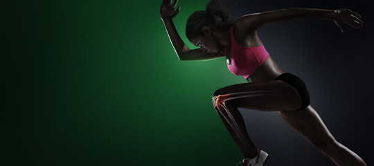 Sport. Isolated Athlete runner with x-ray knee. Silhouette. Start