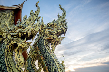 Fototapeta na wymiar Thai Dragon or Serpent King or King of Naga Statue In Thai, Thai art graphic vector. Thailand Water suset Background