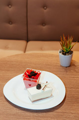 Fresh strawberry and milk pudding with strawberry jelly, chocolate, white chocolate and fresh...