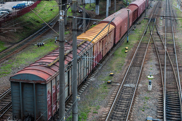 Cargo wagon, railway carriage, rail freight cars on rails
