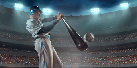 Baseball player bat the ball on professional baseball stadium - obrazy, fototapety, plakaty