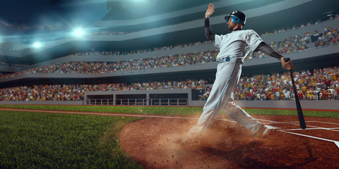 Baseball player bat the ball on professional baseball stadium