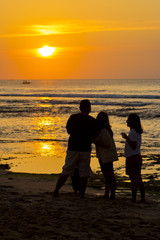 happy family beach view summer holiday sunset