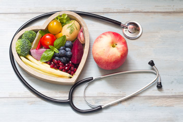 Healthy food in heart diet concept with stethoscope
