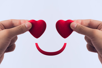 Red heart in hand, the concept of medicine or love