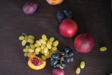 freshly harvested grapes, plums, peaches, nectarines.