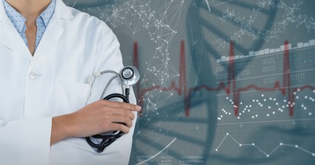 Composite image of doctor holding stethoscope against grey