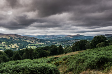 Dark clouds over the hills and landscape