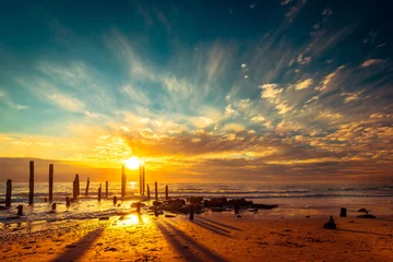  Port Willunga beach with jetty pylons at sunset © myphotobank.com.au