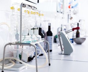 modern laboratory of winery. Checking acidity of wine and organoleptic characteristics