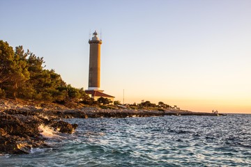 Fototapeta premium Leuchtturm im Sonnenuntergang