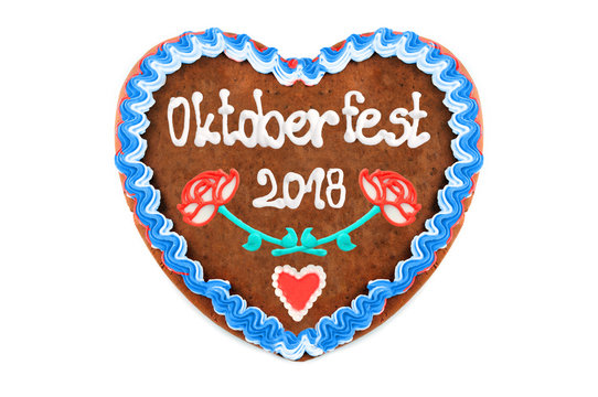 Oktoberfest 2018 (engl. october festival) Gingerbread heart with white isolated background