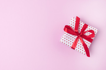Present on a Pink Background Horizontal Copy space Background with Gift Box Flat Lay