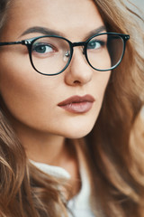 Fashionable eyewear model close-up portrait wearing transparent 