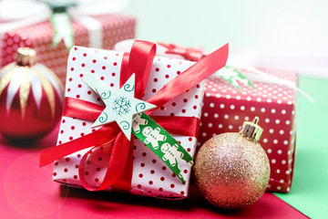 Set of Christmas Gift Boxes Christmas Background Holiday Decorations Presents in a Red Wrapper Red and Green Background Close Up