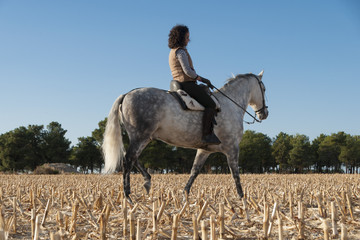 young woman on horseback