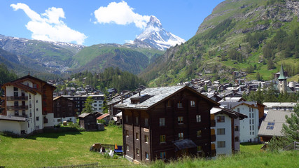 Fototapeta na wymiar Iconic Matterhorn and Village of Zermatt, Switzerland During Sunny Day