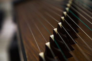 Gu Zheng. The Zheng is a traditional Chinese musical instrument....