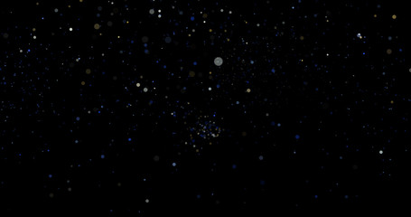 Flying dust particles on a black background