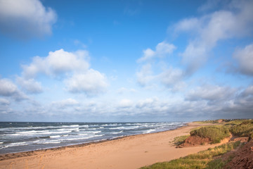 Fototapeta na wymiar Deserted beach and choppy seas on Prince Edward Island