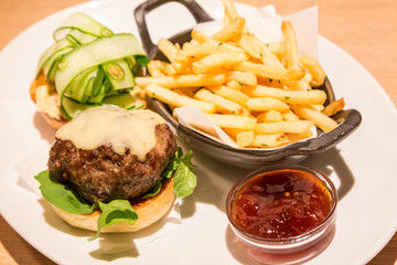 Delicious wagyu beef burger with french fried and sauce.