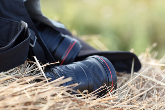 the camera is lying on a haystack, countryside protographer