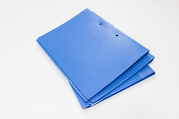 blue files folder retention of contracts and paper on white table in office, , concept Office supplies