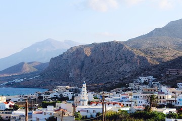 View of Arkasa village at dawn with the mountain headlands in the background on the island of Karpathos in Greece in the Mediterranean Sea