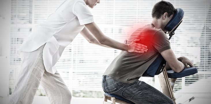 Composite image of man receiving back massage from