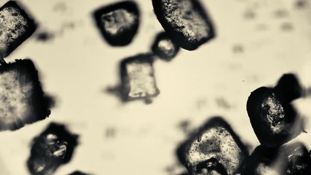 Salt, sugar and soda filmed under a microscope