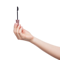 Woman hand with mascara brush isolated on white