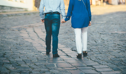 loving couple is walking in the city